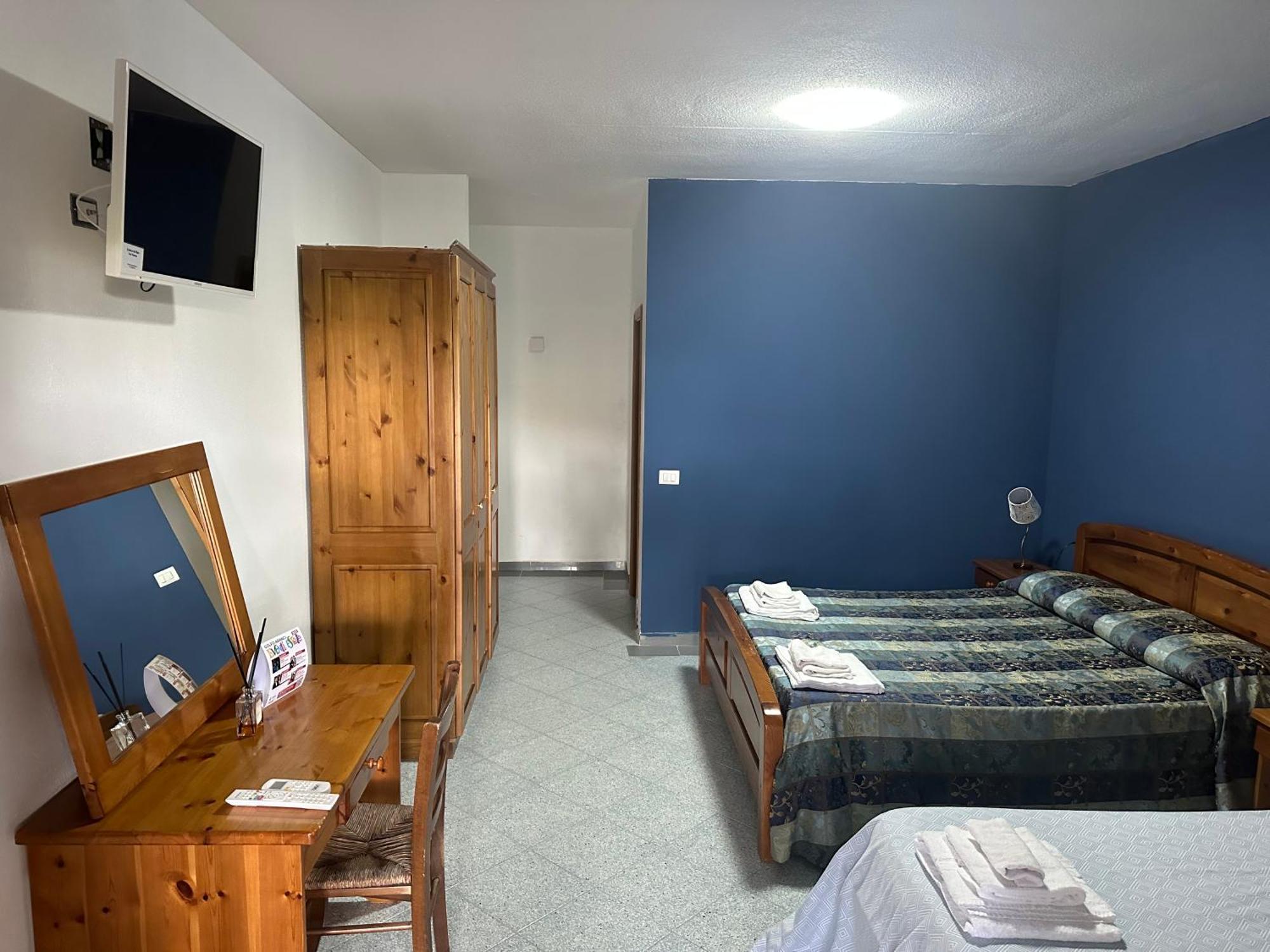 Le Stanze Del Mare Aparthotel Golfo Aranci Exterior foto