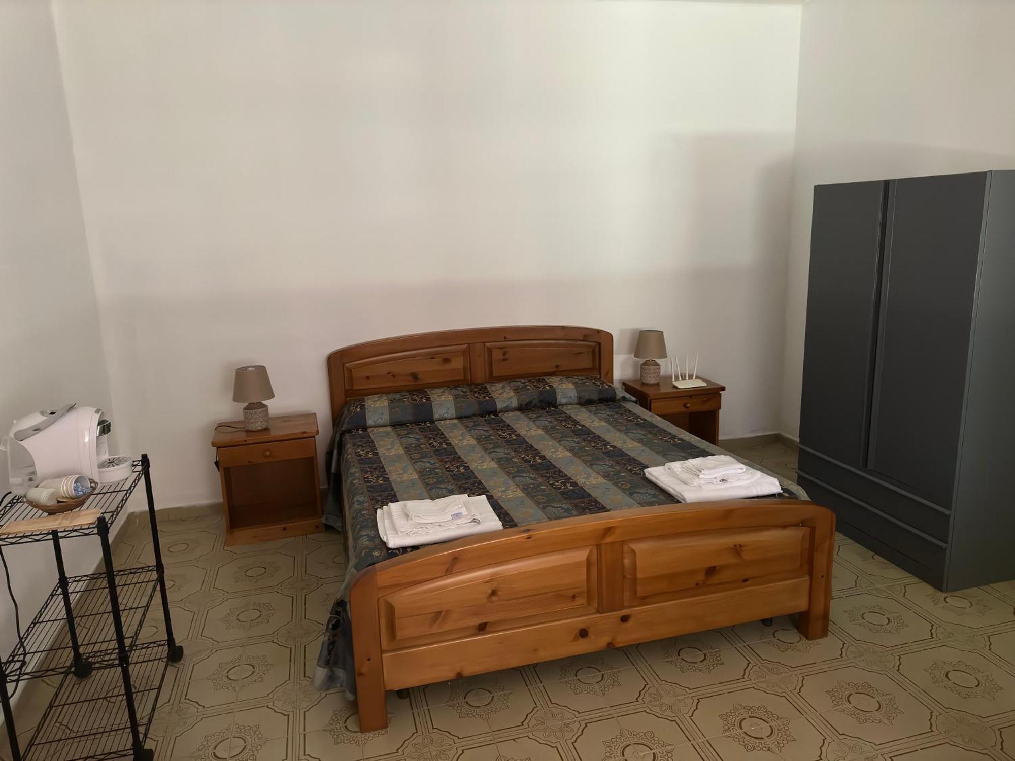 Le Stanze Del Mare Aparthotel Golfo Aranci Quarto foto