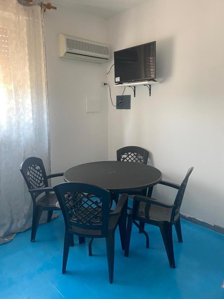 Le Stanze Del Mare Aparthotel Golfo Aranci Quarto foto