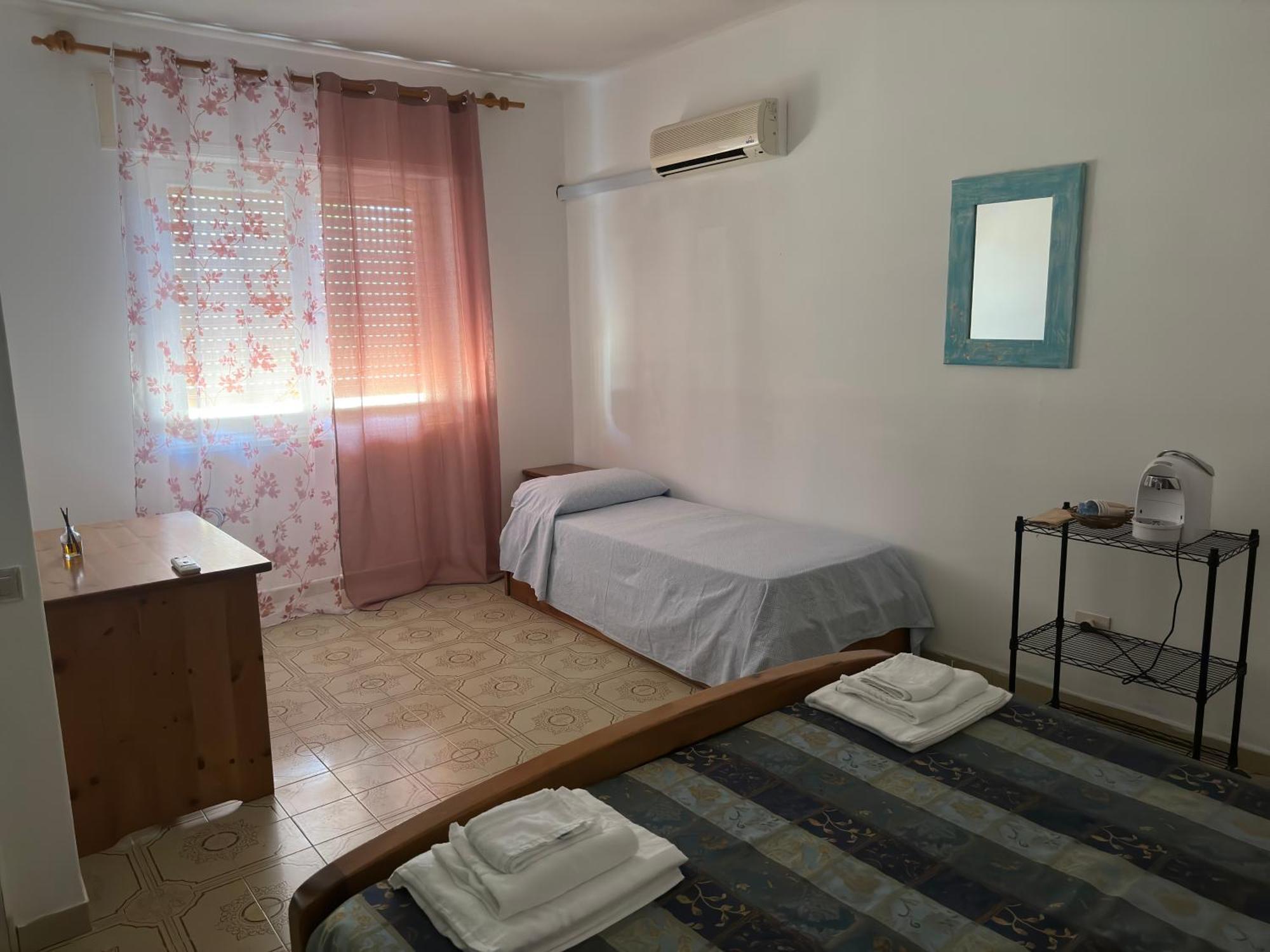 Le Stanze Del Mare Aparthotel Golfo Aranci Quarto foto